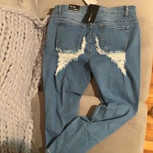 Distressed back skinny jeans